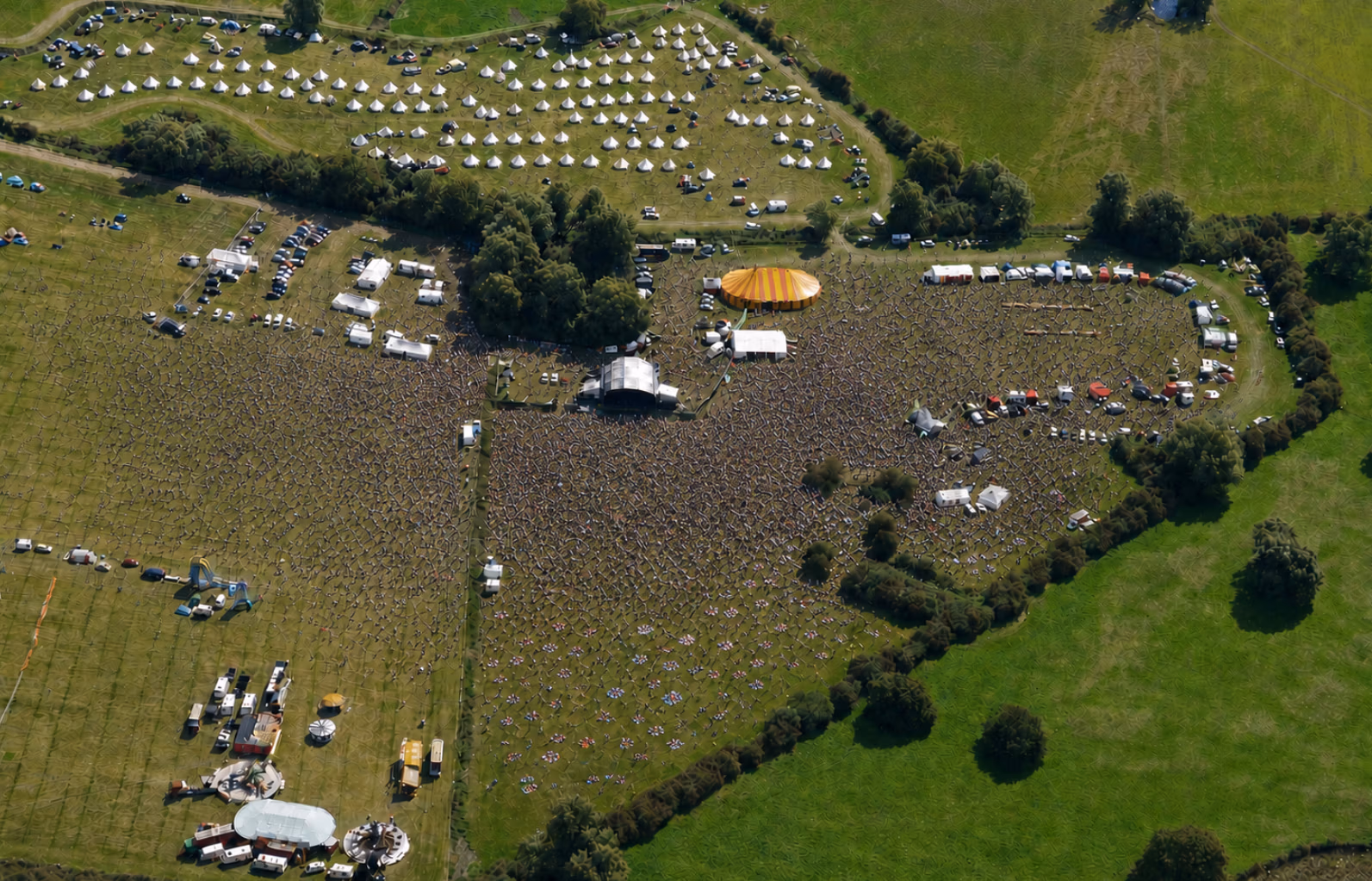Aerial view of LodeStar Festival main arenas showing the main stage, big top and the village green stage near Cambridge.