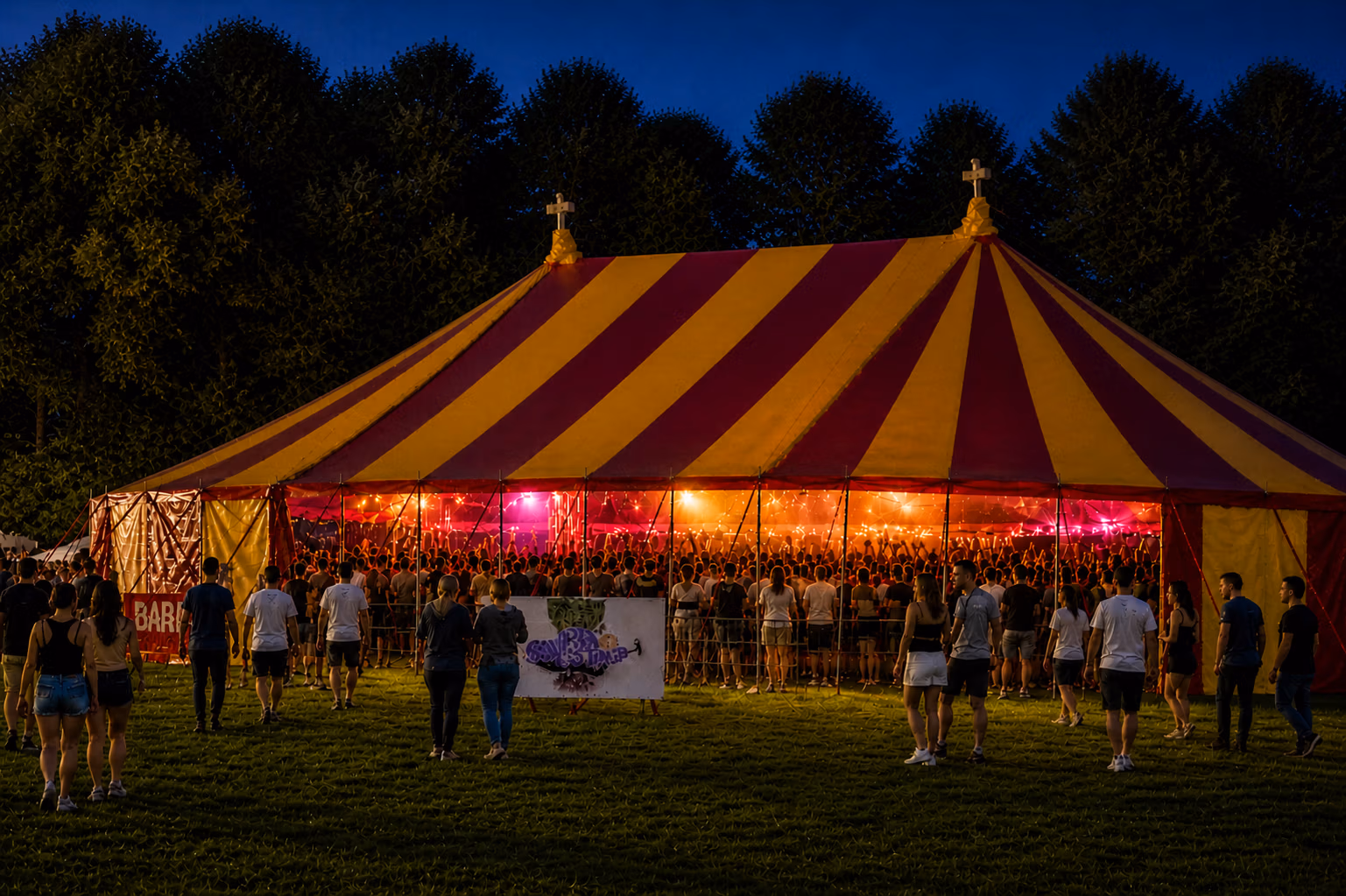 Red and yellow festival big top tent at LodeStar Festival under a blue summer sky.